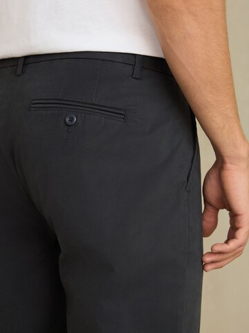 Next Slimfit Chinobyxa 'Motionflex' i blå