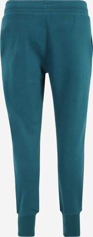 Tapered Pantaloni sport 'Rival' de la UNDER ARMOUR pe verde