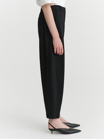 TATUUM - Loosefit Pantalón en negro