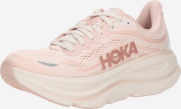Chaussure de course 'BONDI 9' HOKA en rose : devant