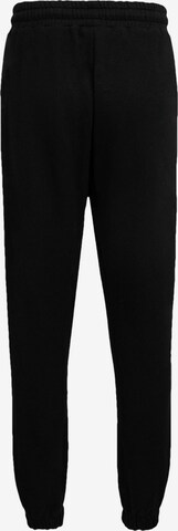 regular Pantaloni sportivi di Unfair Athletics in nero