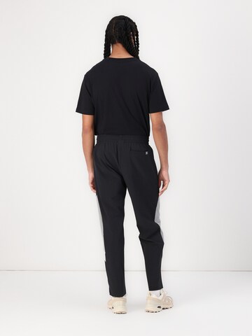 Loosefit Pantalon 'In Game' new balance en noir