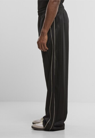 Regular Pantalon Karl Kani en noir