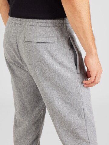 UNDER ARMOUR Tapered Sporthose 'Rival' in Grau