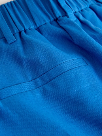 Wide Leg Pantalon à plis Next en bleu