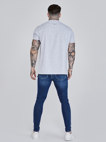 Coupe slim Jean SikSilk en bleu