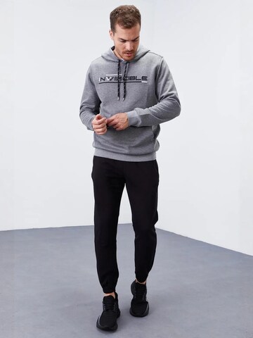 Sweat-shirt Tommy Life en gris
