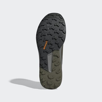 Chaussure de course 'Trailrider' ADIDAS TERREX en vert