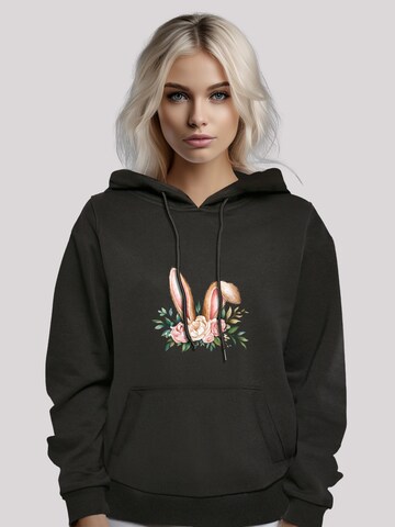 Sweat-shirt 'Blumen Osterhasen Ohren Dekor' F4NT4STIC en noir : devant