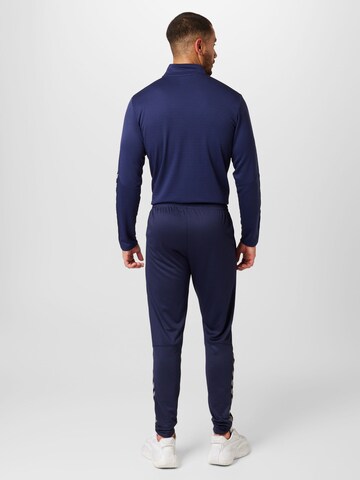 Tapered Pantaloni sportivi di Hummel in blu