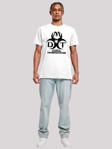 Maglietta 'Harry Potter Department Of Magical Transportation' di F4NT4STIC in bianco