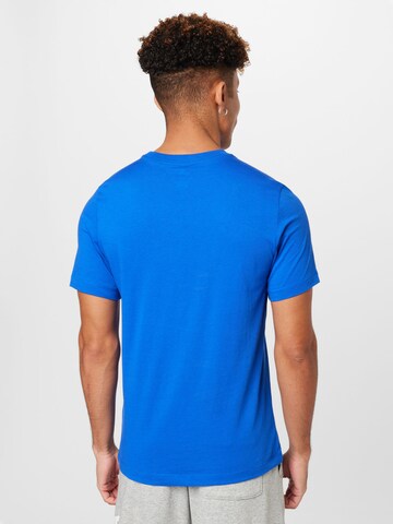 Nike Sportswear - Camisa em azul