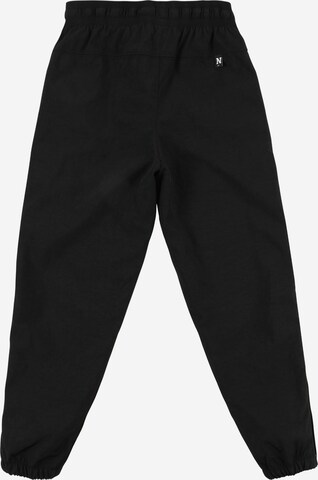 Loosefit Pantaloni sport de la NIKE pe negru