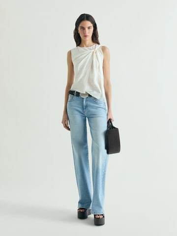 Top ' ' de la Scalpers pe bej: față