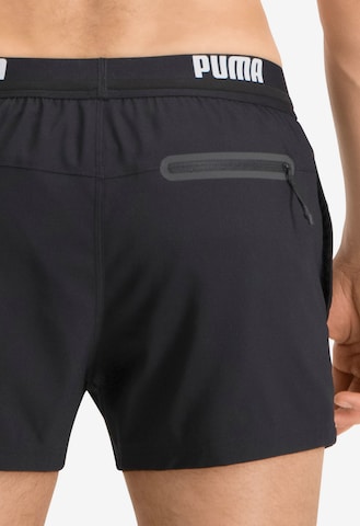 PUMA Regular Badeshorts in Schwarz