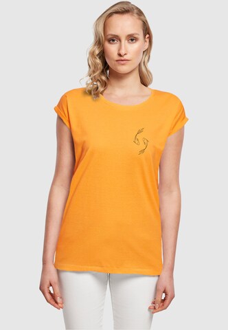 Merchcode Shirt 'Spring -  Yin & Jang Fish' in Orange: front