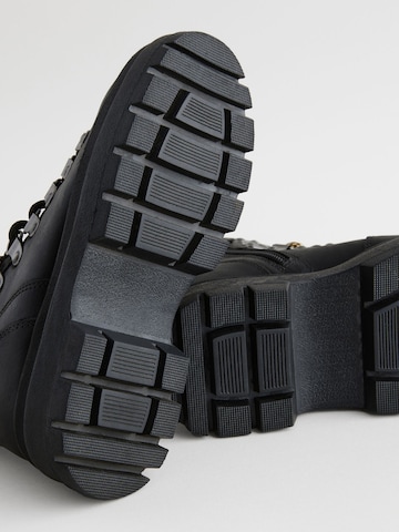Bottes Next en noir