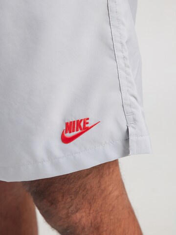 Nike Sportswear Широка кройка Панталон 'CLUB' в сиво