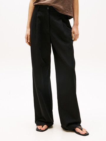 TOMMY HILFIGER Regular Pleat-front trousers in Black: front