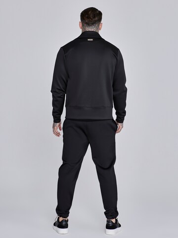 Loosefit Pantaloni di SikSilk in nero