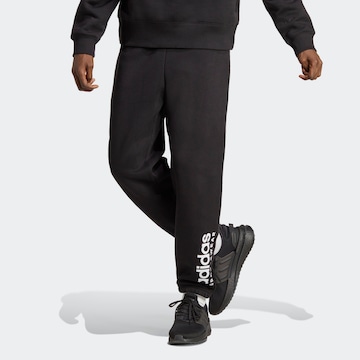 Effilé Pantalon de sport ADIDAS SPORTSWEAR en noir : devant
