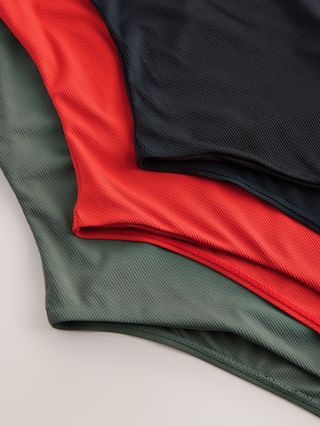 Next - Traje de baño en verde