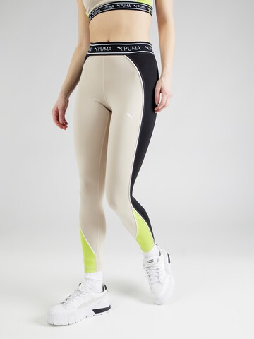 PUMA Skinny Sportbroek in Beige: voorkant