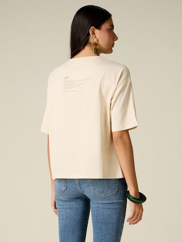 T-shirt oltre en beige