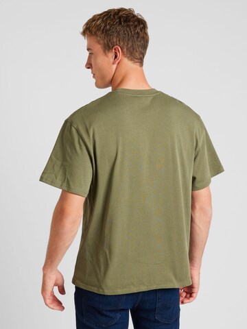 T-Shirt Han Kjøbenhavn en vert
