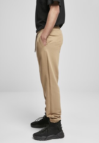 Tapered Pantaloni di Urban Classics in beige