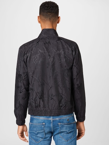 Han Kjøbenhavn Between-Season Jacket 'Track' in Black