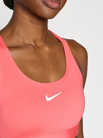 NIKE Bustier Športni nederček 'SWOOSH' | oranžna barva