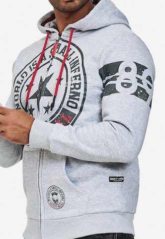 Rusty Neal Zip-Up Hoodie in Grey