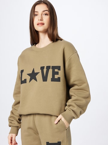 RAIINE Sweatshirt 'LAUREL' in Grün: predná strana