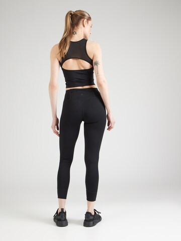 Skinny Pantaloni sportivi di Champion Authentic Athletic Apparel in nero