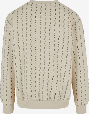 Sweat-shirt Karl Kani en beige