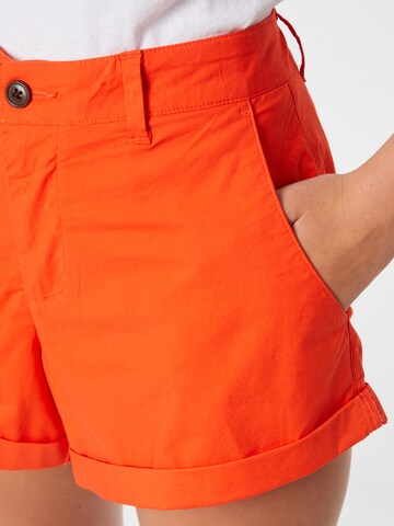 Superdry Široke hlačnice Chino hlače 'Studios' | oranžna barva