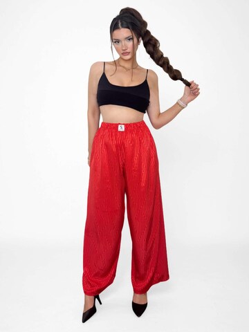 Wide leg Pantaloni 'Nyl' di NAYELPARIS in rosso