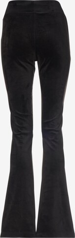 évasé Pantalon Karl Kani en noir