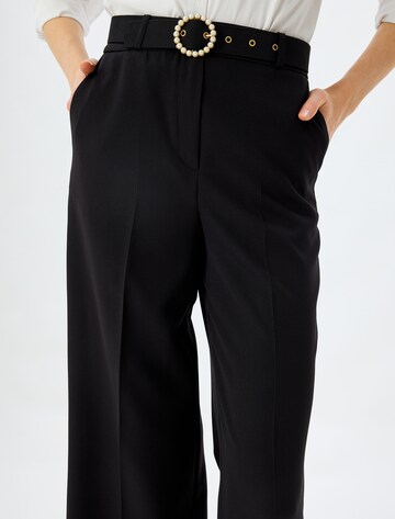 Koton Bootcut Hose in Schwarz