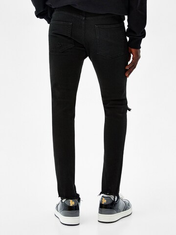 Coupe slim Jean Bershka en noir