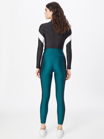 Skinny Pantalon de sport PUMA en vert