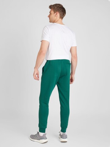 ADIDAS SPORTSWEAR Tapered Workout Pants 'Essentials' in Green