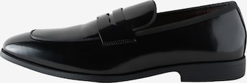 Next Slip-ons in Black: front