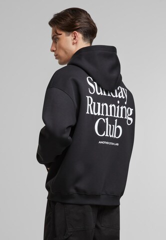 Another Cotton Lab - Casaco em moletão 'Sunday Running Club' em preto: frente