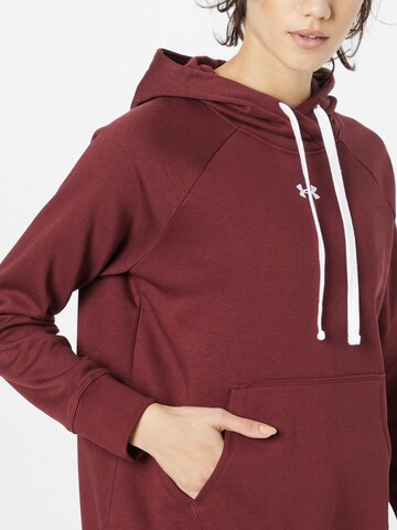 UNDER ARMOUR Sport sweatshirt 'Rival' i röd