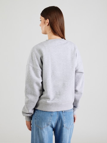 GUESS JEANS Tréning póló 'ICONIC' - szürke