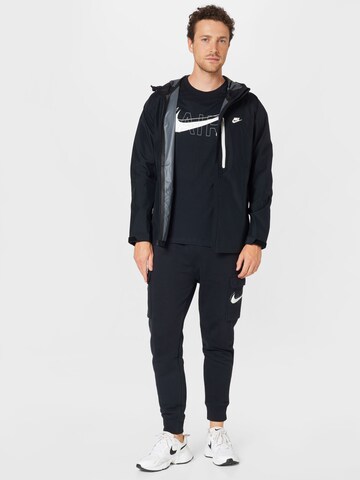 Nike Sportswear Alt kitsenev Klapptaskutega püksid, värv must