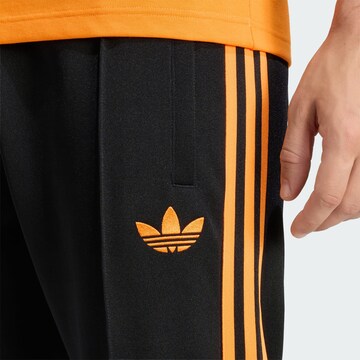 ADIDAS PERFORMANCE Tapered Παντελόνι φόρμας 'Ajax Amsterdam' σε μαύρο
