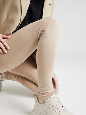 Skinny Leggings 'Kaya' ABOUT YOU en beige